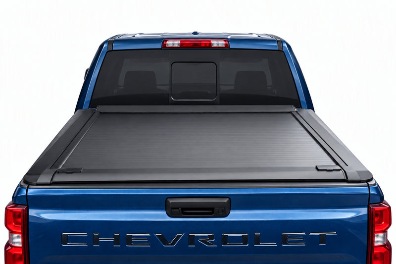 Truck bed fully open with the cover retracted into its canister