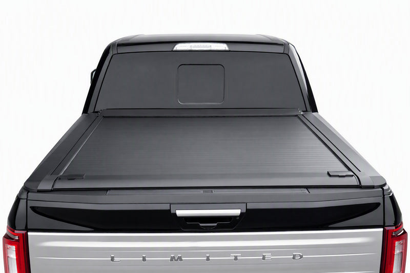 Truck bed fully open with the cover retracted into its canister