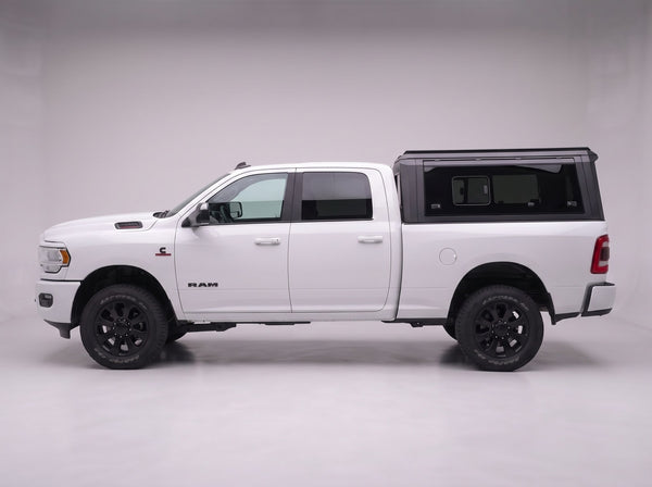 Side profile of the truck cap on a Dodge Ram 2500/3500, following the cab lines