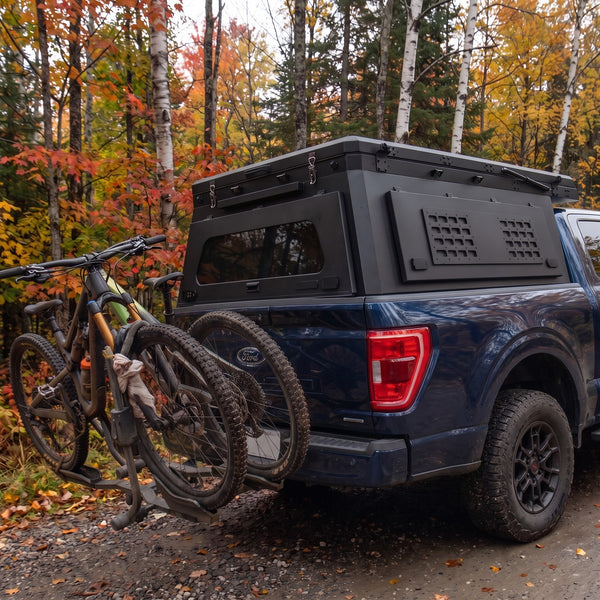 Locking side MOLLE panel on the aluminium truck cap camper