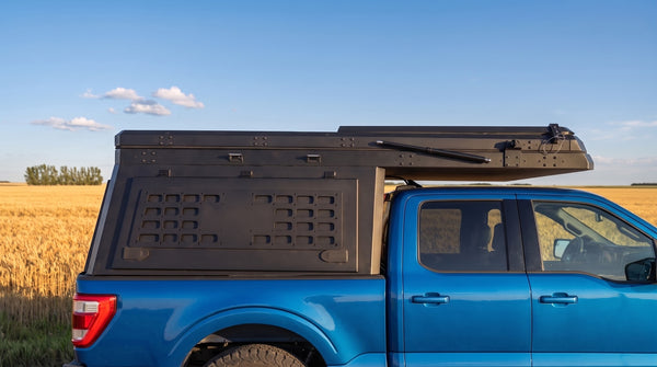 Locking side MOLLE panel on the aluminium truck cap camper