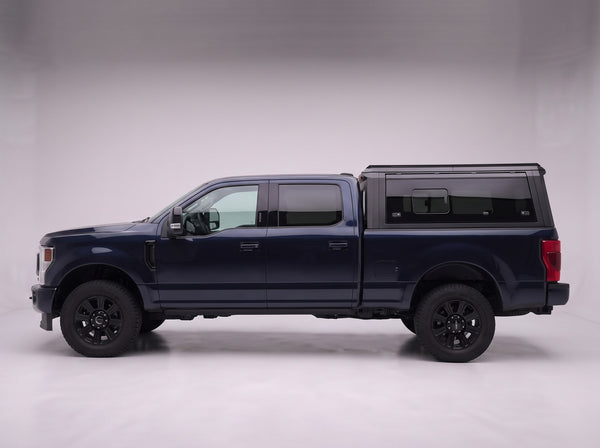 Side profile of the truck cap on a Ford Super Duty, following the cab lines