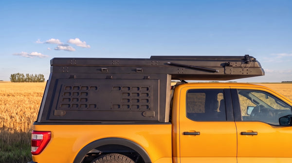 Locking side MOLLE panel on the aluminium truck cap camper