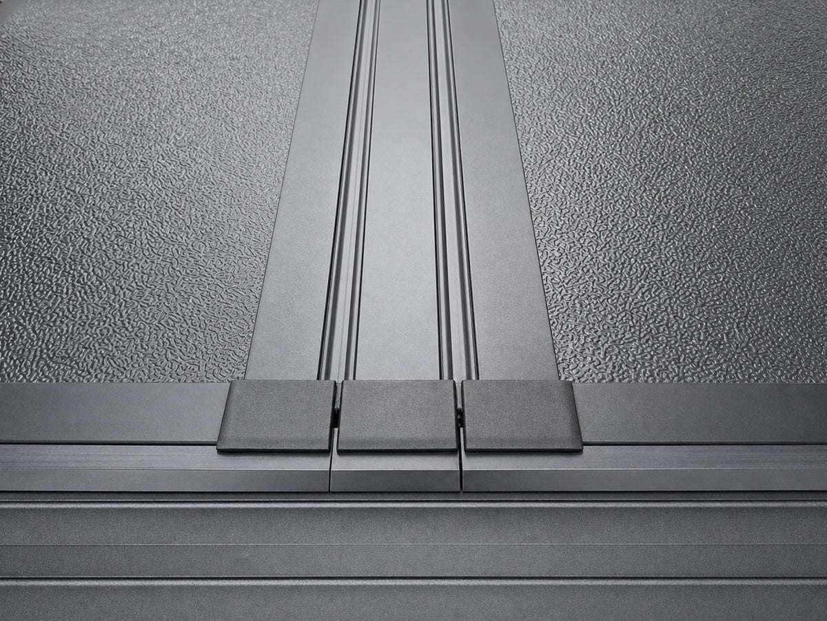 Textured aluminum panel surface and centre rail detail