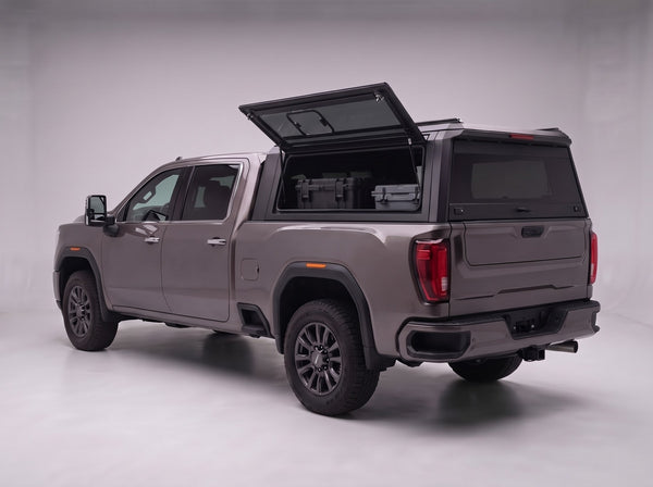 Lift-up tinted side window on the GMC Sierra 2500/3500 aluminum truck cap