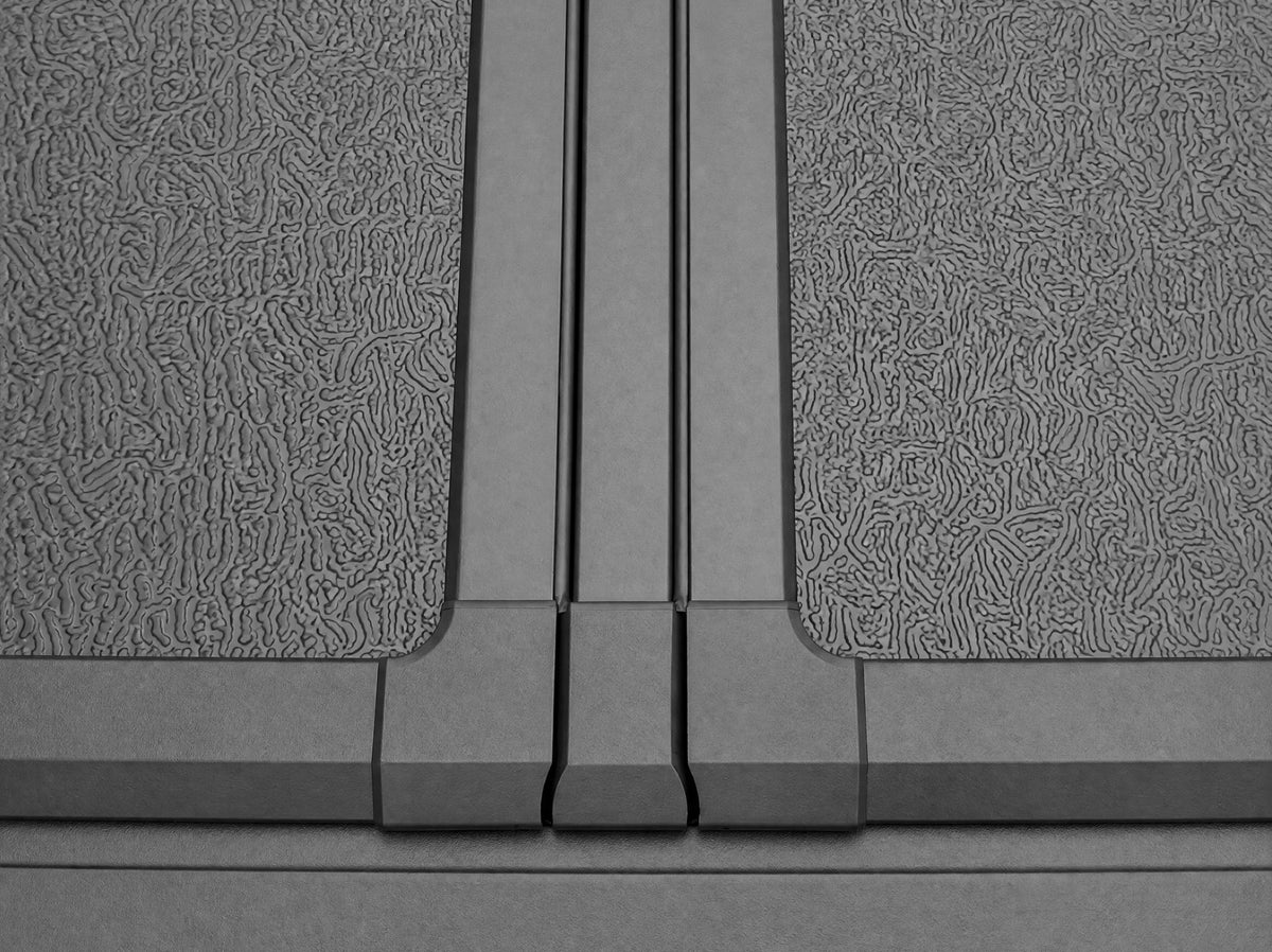 Textured aluminum honeycomb panel surface close-up