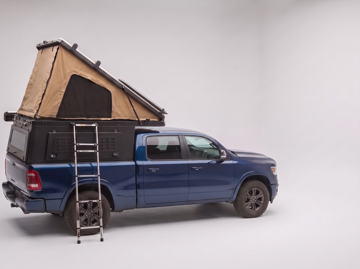 Step 2, main roof up: the roof tent open with the second hatch still closed, on a Ram 1500