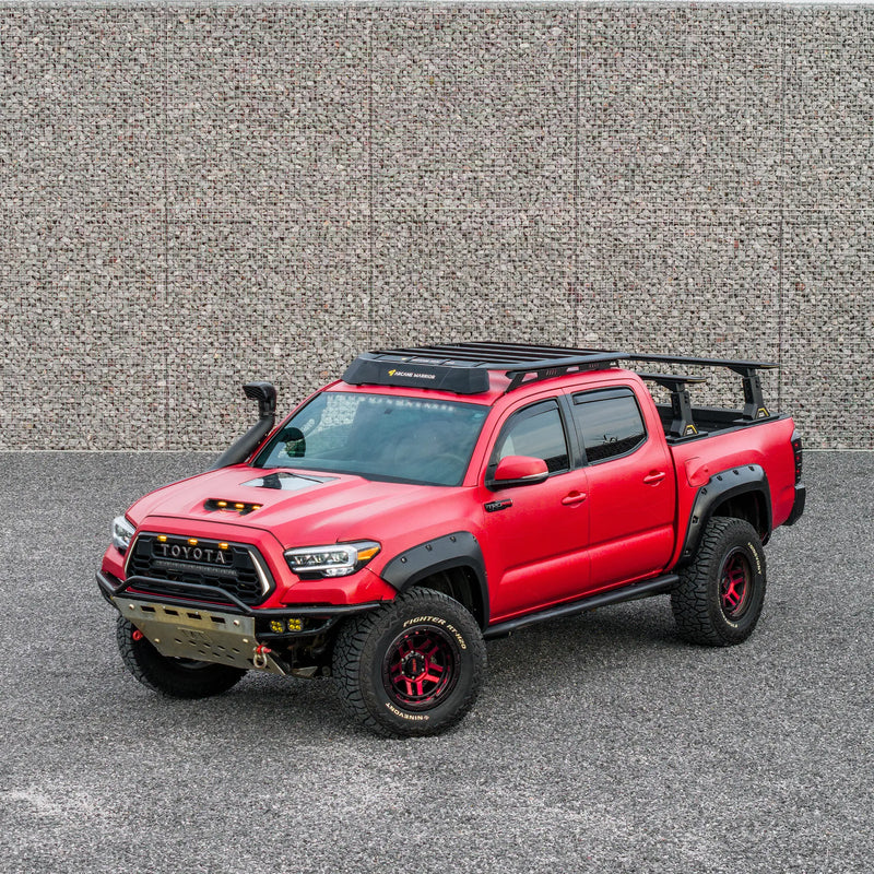 Toyota Tacoma with STORM roof rack, side three-quarter view