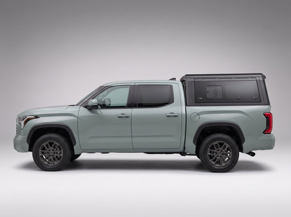 Side profile of the truck cap on a Toyota Tundra, following the cab lines