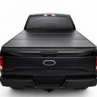 Low profile hard folding tonneau cover on truck bed — view 2