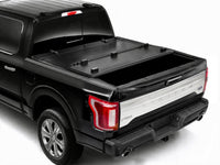 Front panel flipped open on the TruckTon hard flip-back tonneau cover — view 10