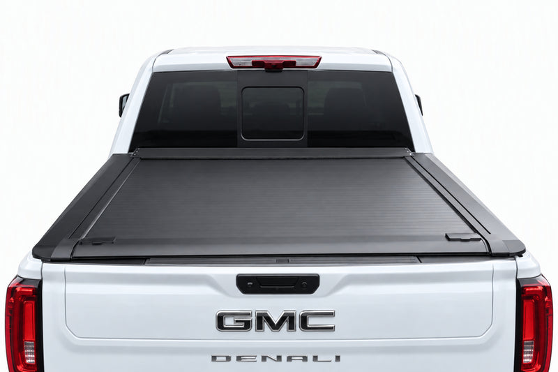 Truck bed fully open with the cover retracted into its canister