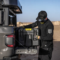 Loading a 116L FLEX case onto a truck tailgate — view 7