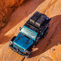 FLEX Rugged Cargo Cases on a Jeep roof rack, front aerial view — view 9