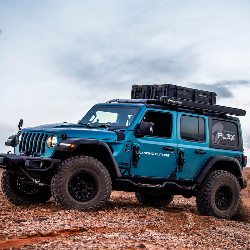 Jeep Wrangler with FLEX Rugged Cargo Cases on its roof rack
