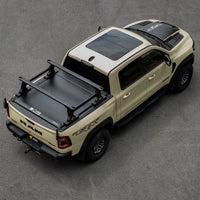 ULTRARIDGE bed rack over a closed roll-up tonneau cover, rear three-quarter view — view 4