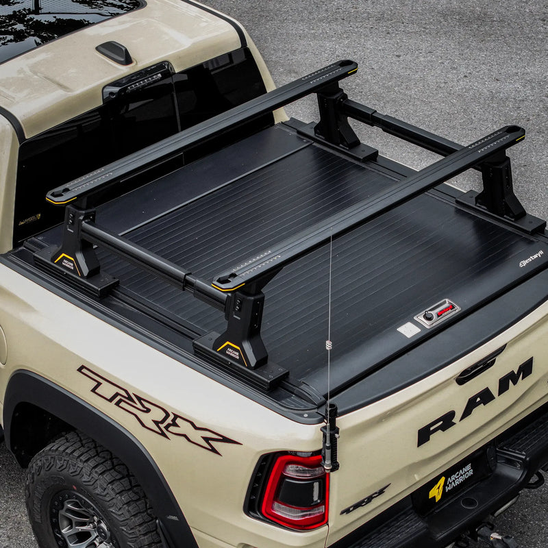 ULTRARIDGE rack clamped to the tonneau cover T-slot rails