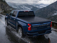 Sealed flip-back cover in heavy rain — Chevy Silverado — view 18
