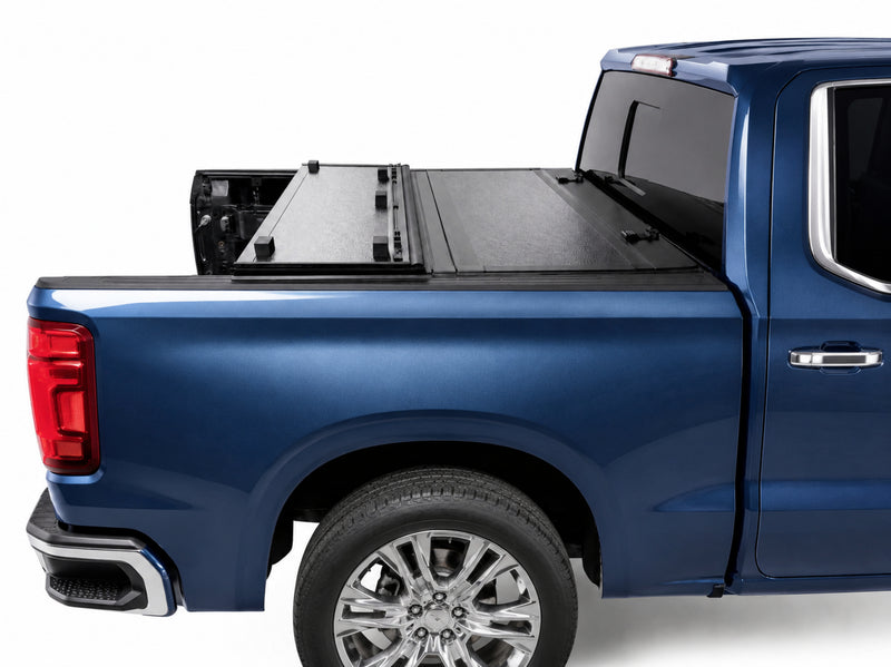 Cover folded toward the cab for flexible bed access