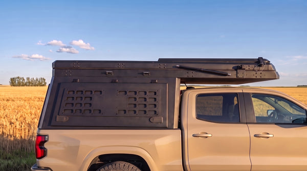 Locking side MOLLE panel on the aluminium truck cap camper
