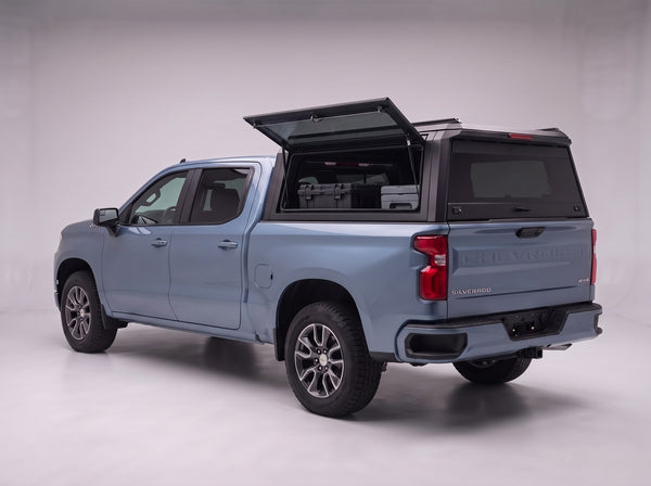 Lift-up tinted side window on the Chevrolet Silverado 1500 aluminum truck cap