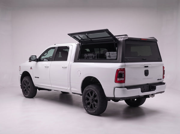 Lift-up tinted side window on the Dodge Ram 2500/3500 aluminum truck cap