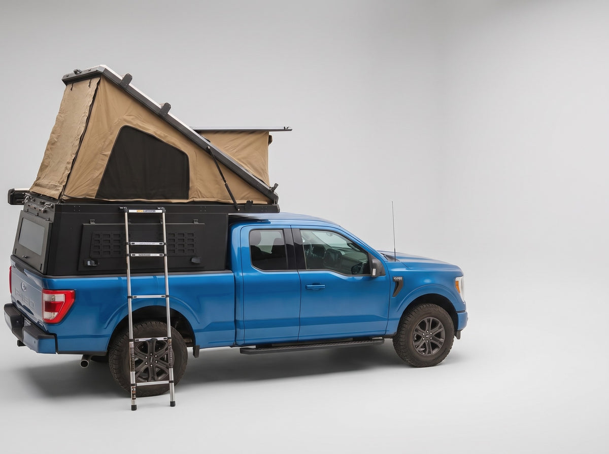Studio side view of the Double Pop-Up truck cap camper on a Ford F-150