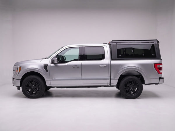 Side profile of the truck cap on a Ford F-150, following the cab lines