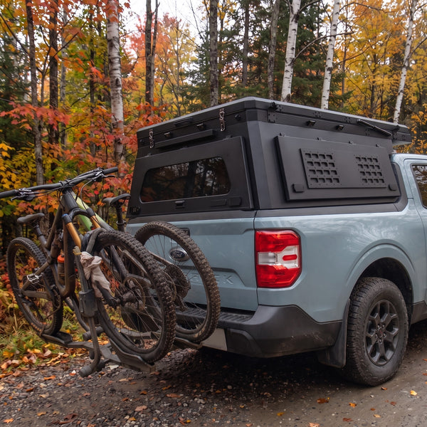 Locking side MOLLE panel on the aluminium truck cap camper
