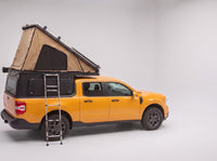 Step 2, main roof up: the roof tent open with the second hatch still closed, on a Ford Maverick