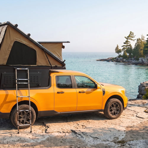 Ford Maverick Double Pop-Up truck cap camper with the roof tent open on the Georgian Bay shoreline in Ontario