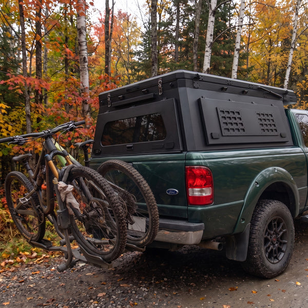 Locking side MOLLE panel on the aluminium truck cap camper