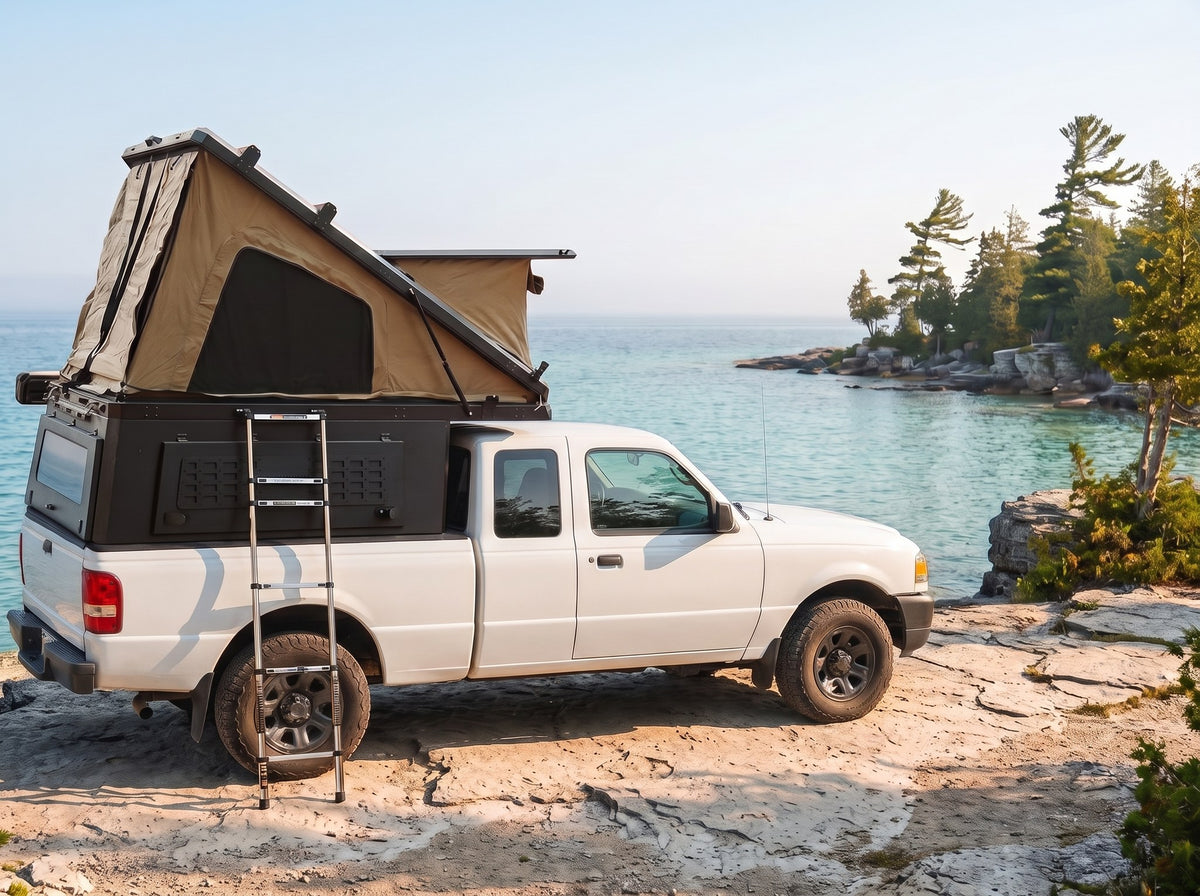 Ford Ranger Double Pop-Up truck cap camper with the roof tent open on the Georgian Bay shoreline in Ontario