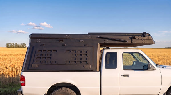 Locking side MOLLE panel on the aluminium truck cap camper