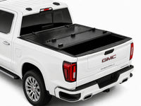 Front panel flipped open on the TruckTon flip-back cover — GMC Sierra — view 10