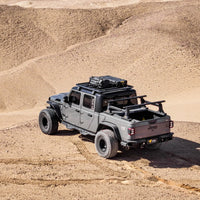 Jeep Gladiator with STORM roof rack on a sand trail — view 7