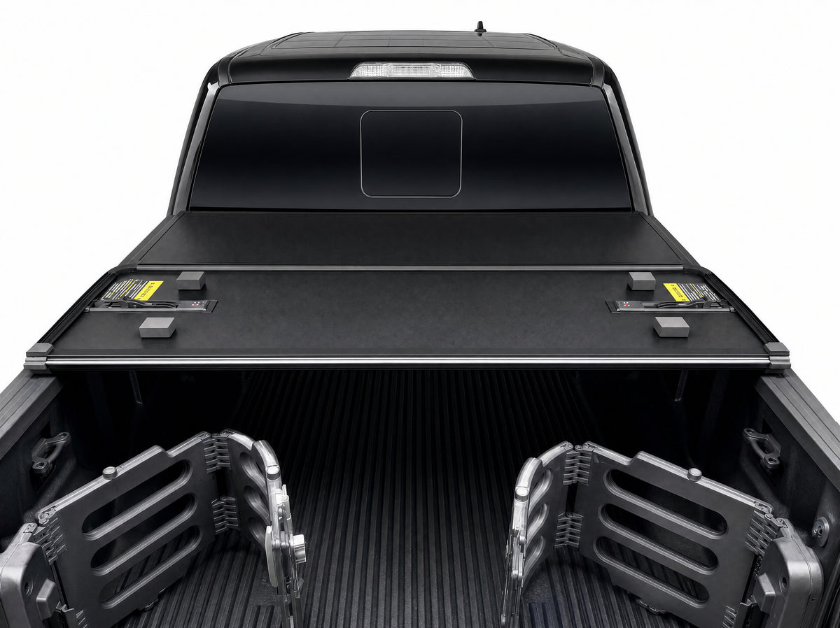 Folded cover viewed from inside the truck bed — clamp-on rails