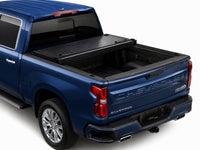 Cover folded open showing the truck bed — view 10
