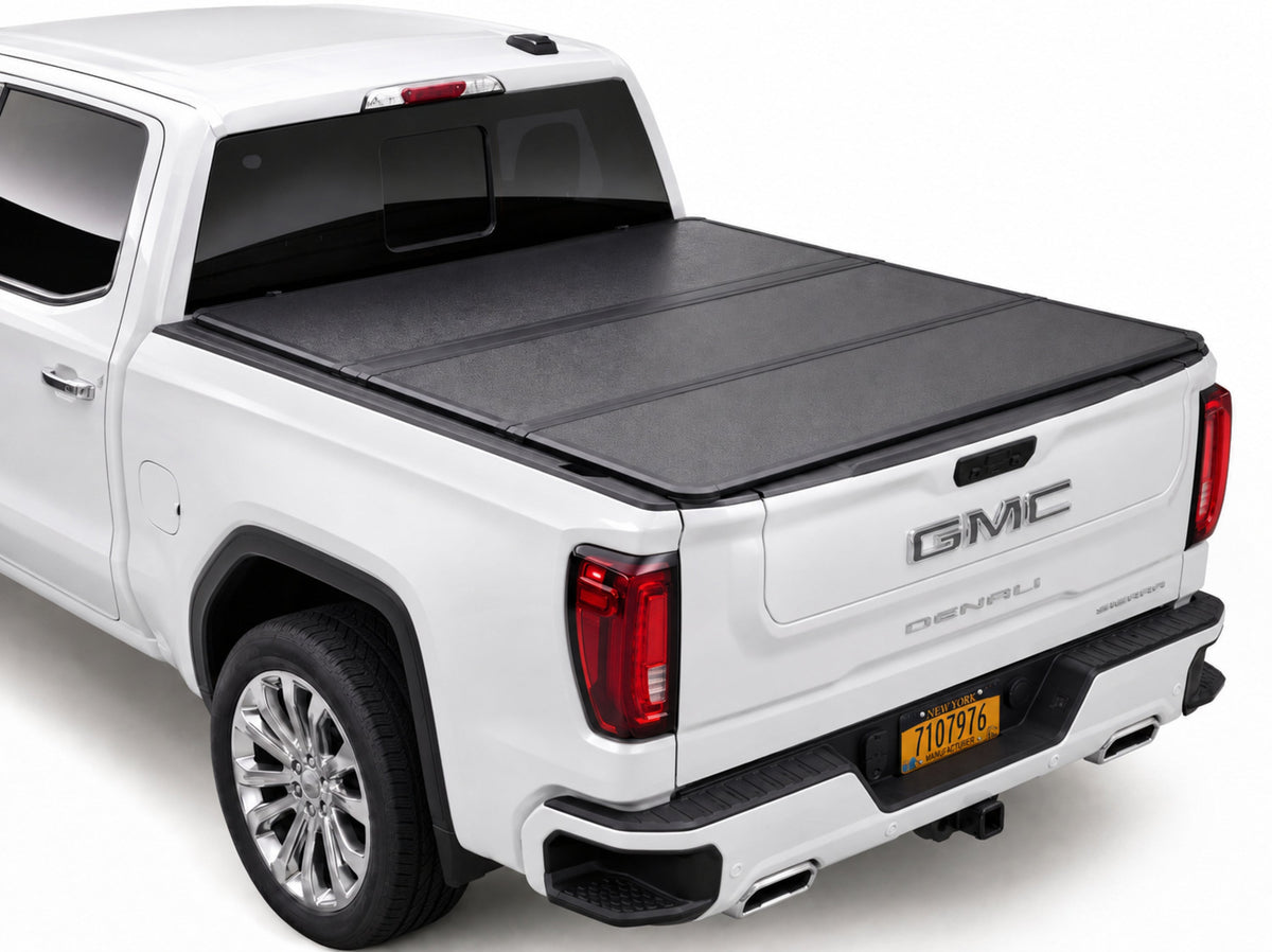 TruckTon low-profile hard tri-fold tonneau cover closed on a GMC Sierra