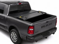 Low-profile cover partially folded for bed access — view 9