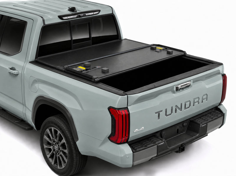 Cover folded toward the cab for flexible bed access