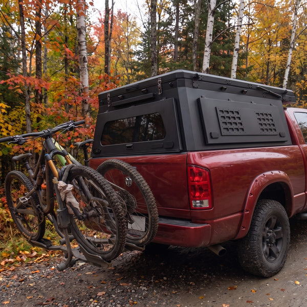 Locking side MOLLE panel on the aluminium truck cap camper