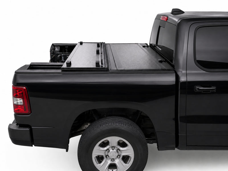 Cover folded toward the cab for flexible bed access