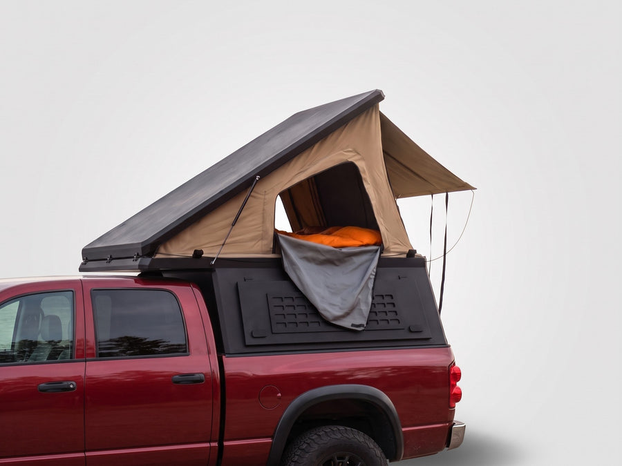 Single Pop-Up truck cap camper on a Dodge Ram 2500/3500, shown for comparison with the Double Pop-Up