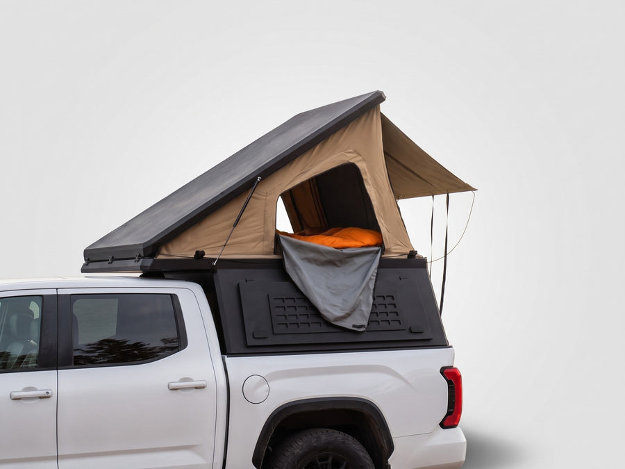 Single Pop-Up truck cap camper on a Toyota Tundra, shown for comparison with the Double Pop-Up
