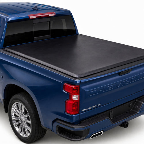 TruckTon soft tri-fold tonneau cover closed on a Chevy — low flush profile
