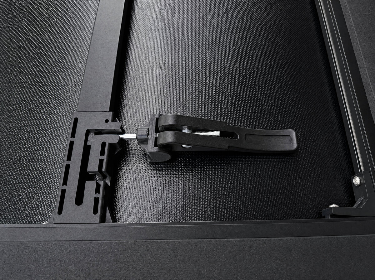 Aluminum frame and tension clamp under the vinyl cover