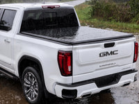 Soft tonneau cover shedding heavy rain — view 15