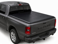 TruckTon soft tri-fold tonneau cover closed on a RAM — low flush profile — view 1