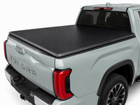 Soft tri-fold cover partially folded open — view 8